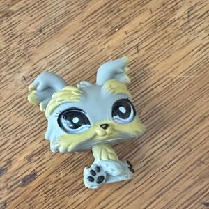 Gray and Yellow Toy Figure